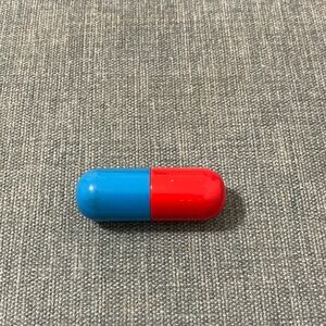 Blue and Red Pill Container